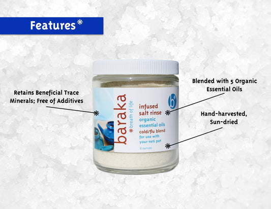 Jar of Baraka salt with features listed on a textured white background