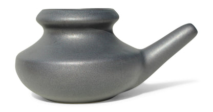 Matte Black ceramic neti pot on a white background